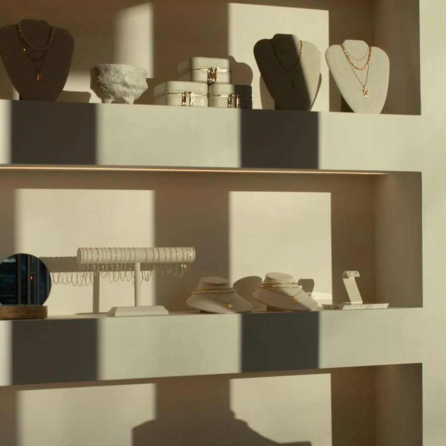 Jewellery displayed on shelves in a boutique
