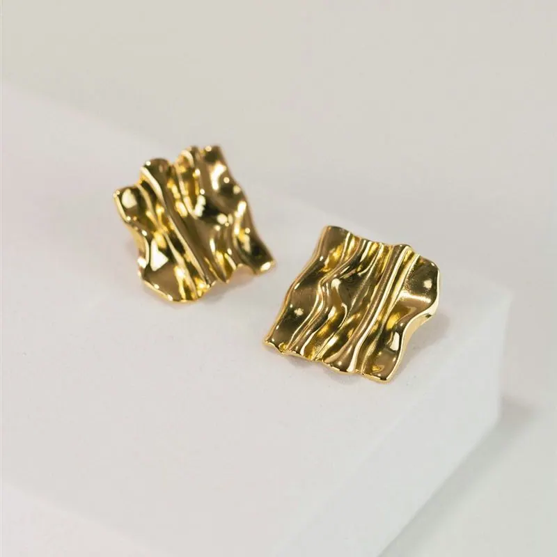 Sleek Ribbon Gold Stud Earrings